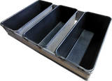 Top view of three strapped 450g commercial bread pans